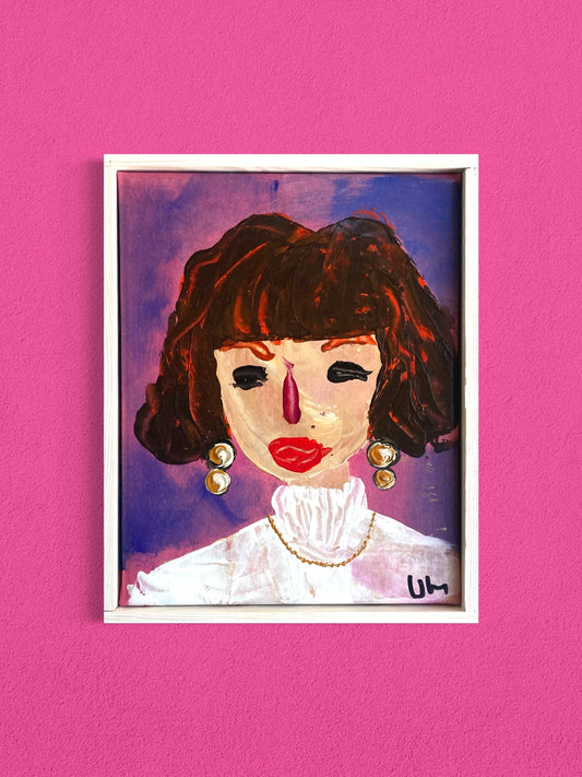 Dam med guldörhängen